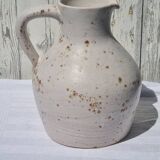 Ceramic pitcher signed Jeanne