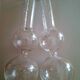 Single-stem vases made of flasks