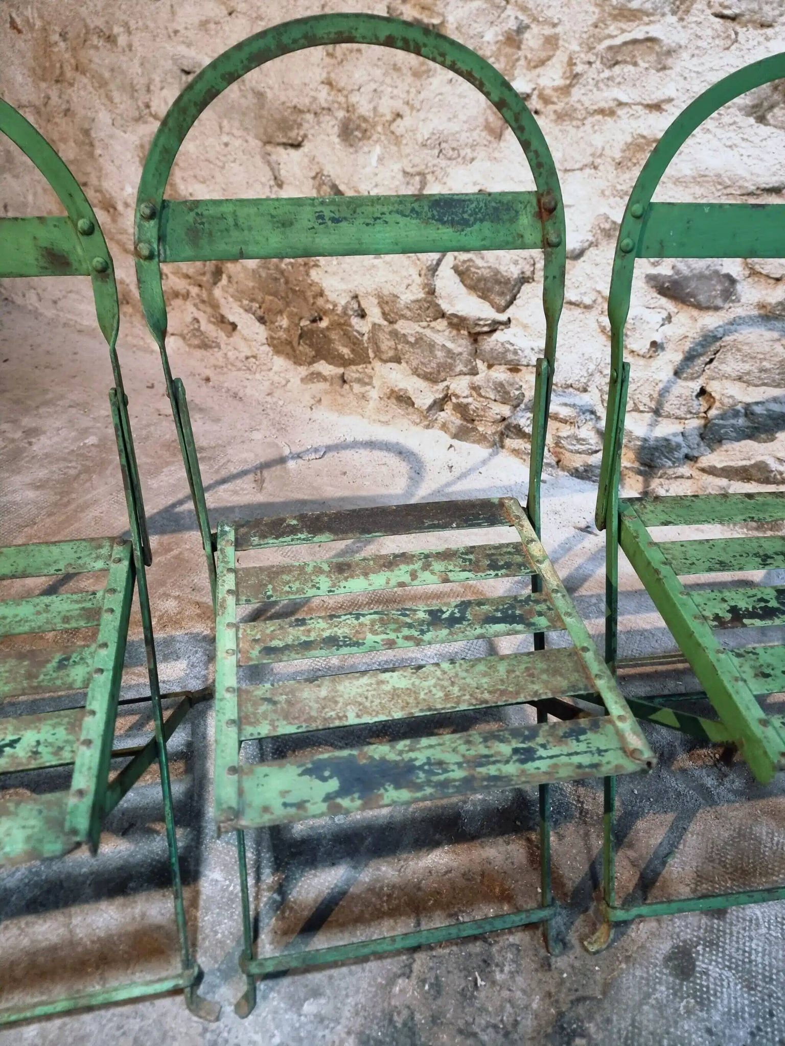 Set of 4 Antique Iron Folding Garden Chairs - 1920s Riveted Bistro Chairs with Aged Green Patina