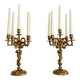 Solid bronze candlesticks decorated with putti, acanthus leaves and lion heads