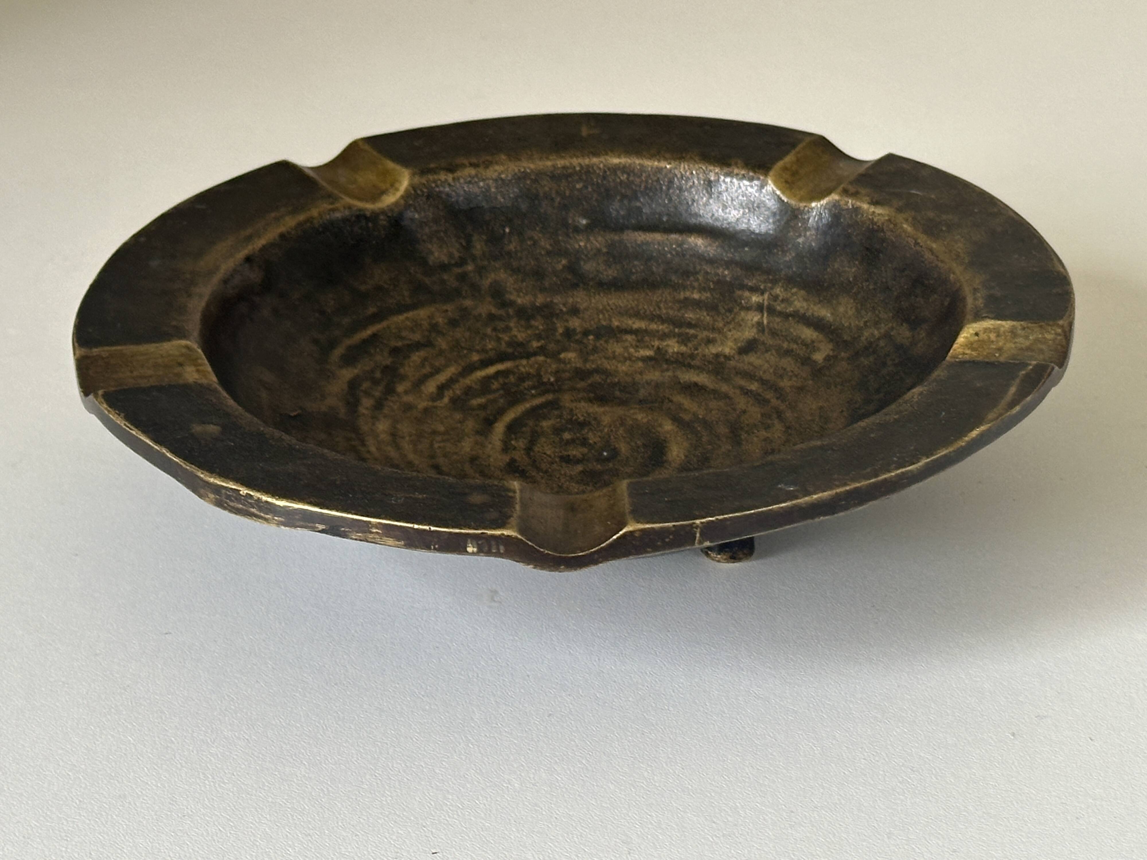 Vintage bronze ashtray design from the 60s