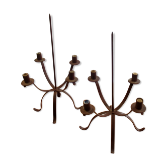 Pair of candle holders, in painted iron