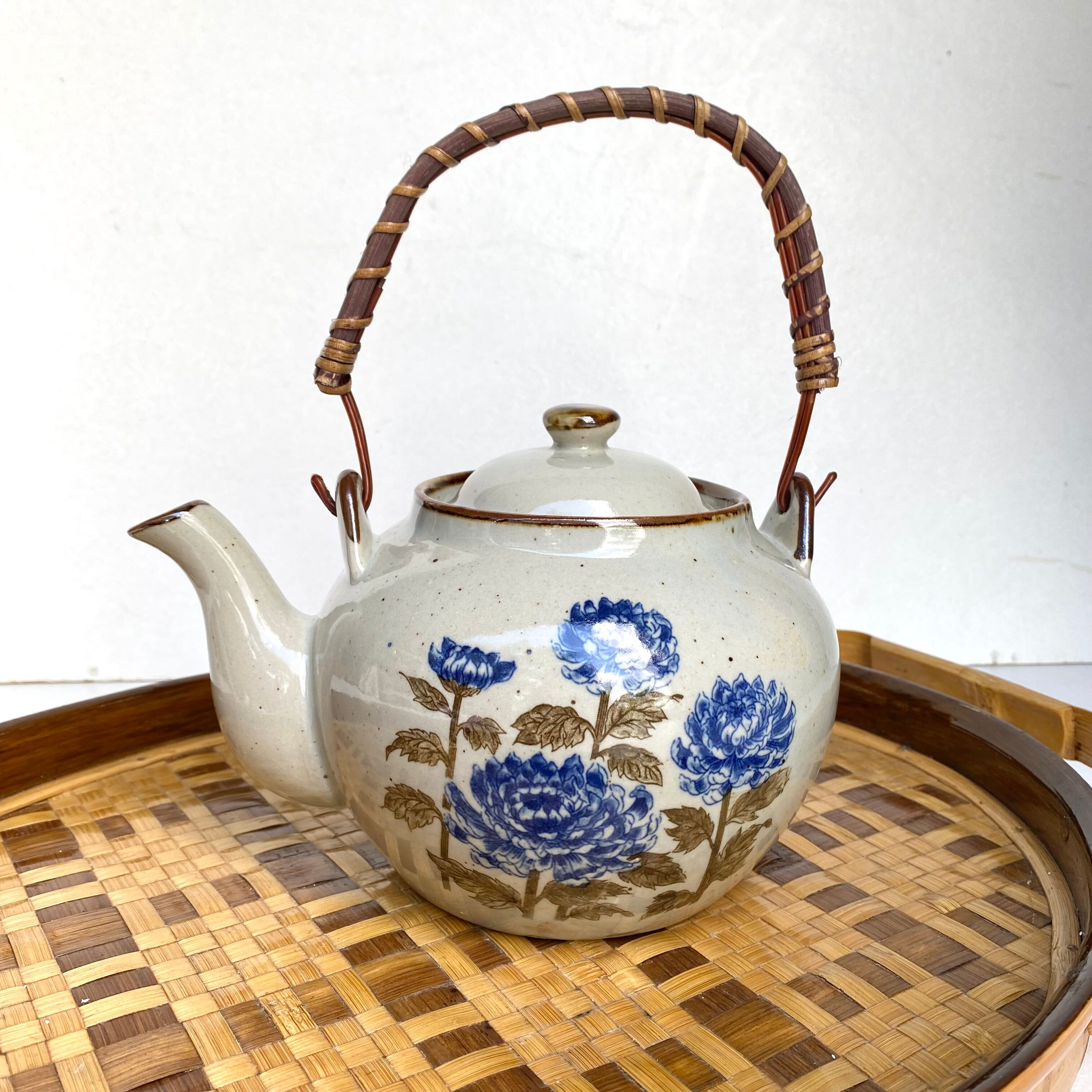 Vintage sandstone teapot wicker handle