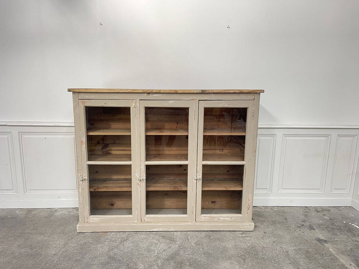 Old 1900 wooden grocery store display case with shelves