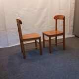 pair of solid pine chairs by Rainer Daumiller