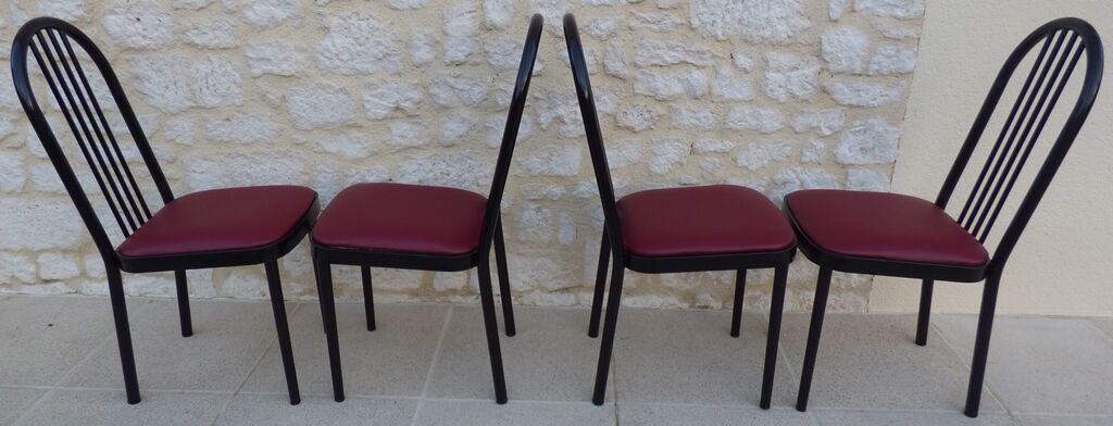 4 metal chairs with burgundy imitation leather seats from the Souvignet brand