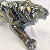 Art Deco lion statue 1930 cracked Saint Clément