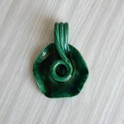 Vintage green glazed ceramic candle holder, organic design.