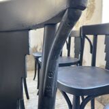 Set of 7 black bistro chairs