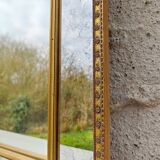 Mirror with glazing bead