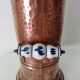 Old umbrella stand in copper, brass and porcelain