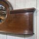 English mahogany shelf with its bevelled mirror from the early 20th century.