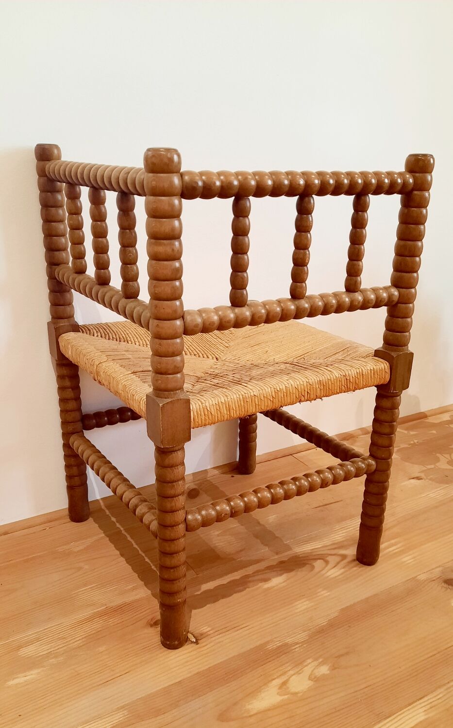 Turned wooden corner chair