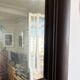 Beveled vintage mirror in painted wood 95x68cm