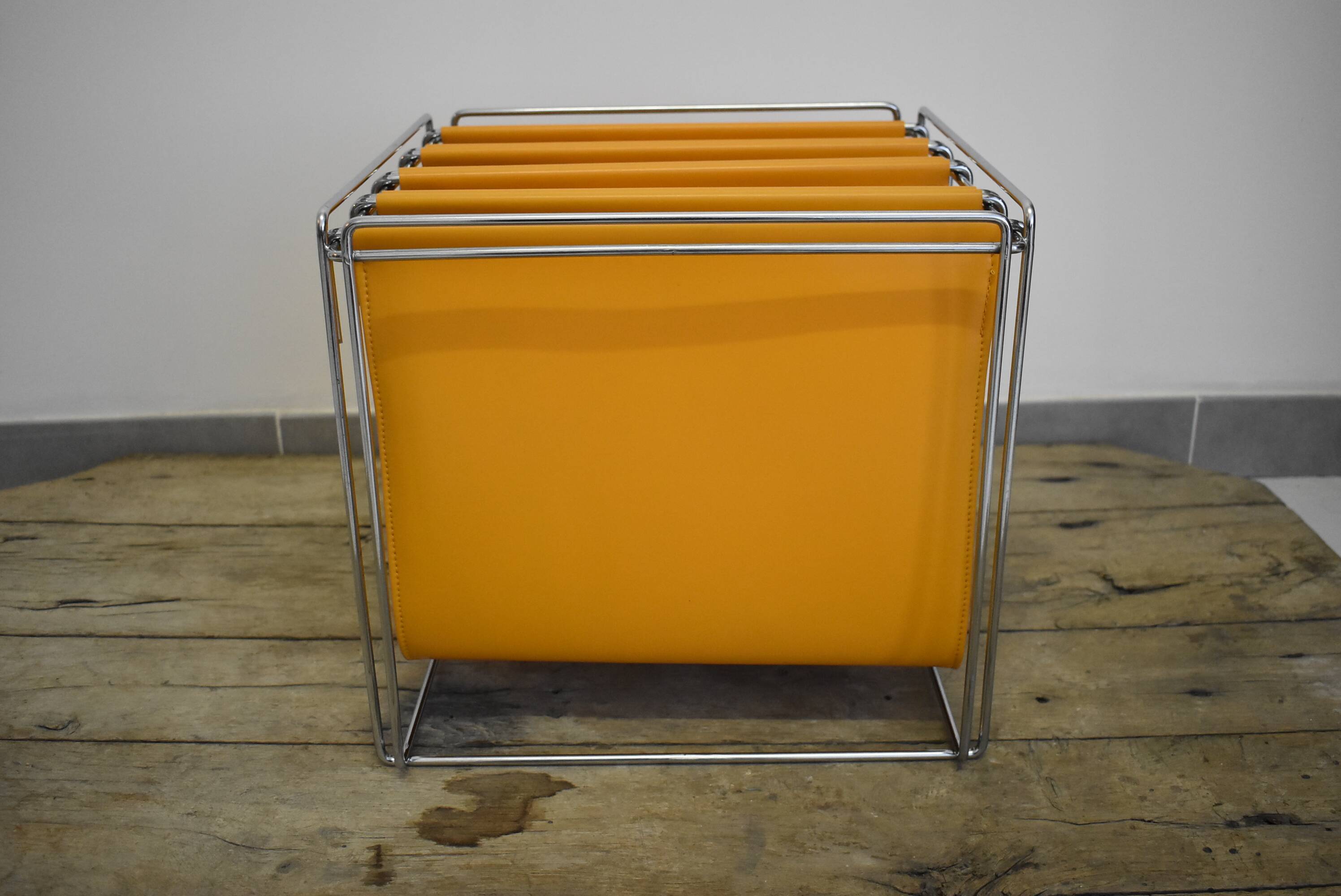 70s Orange magazine holder by Max Sauzé