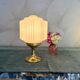 Art Deco lamp from the 1930s with an opaline globe featuring a pink flower.