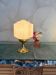 Art Deco lamp from the 1930s with an opaline globe featuring a pink flower.