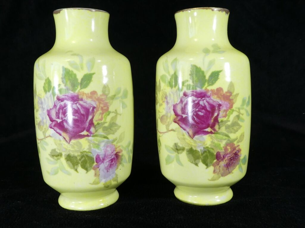 Pair of Limoges porcelain vases decorated with rose bushes