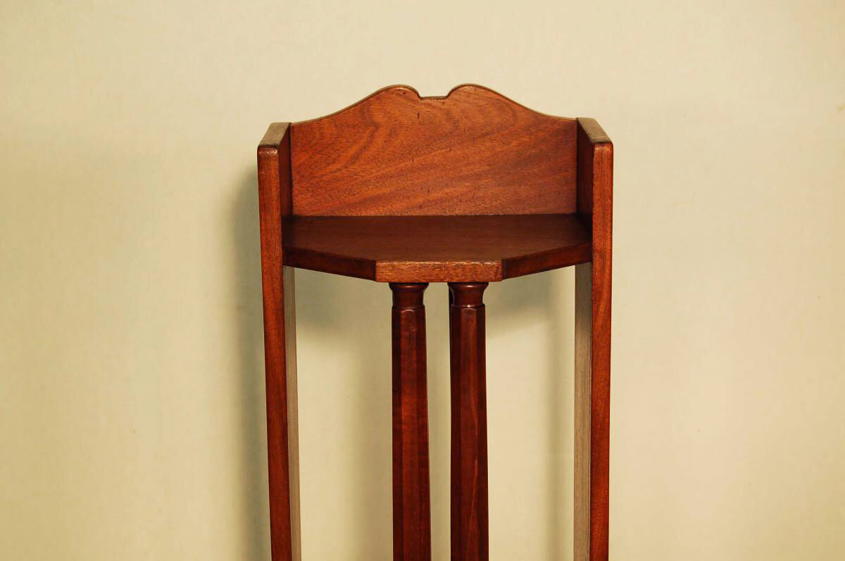 Pair of art deco mahogany wall columns