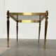 Mid-century German Hollywood neoclassical brass and glass side table from the 1950s.
