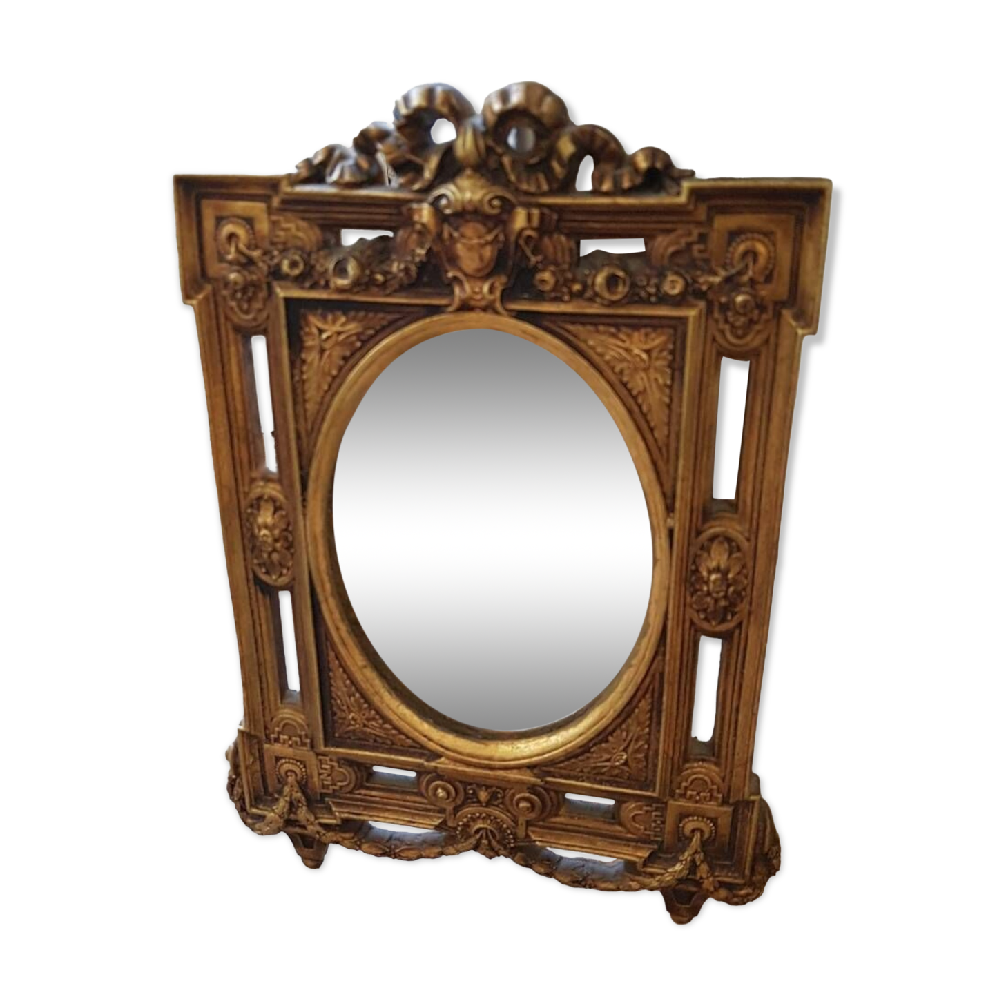 Old small golden mirror