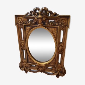 Old small golden mirror