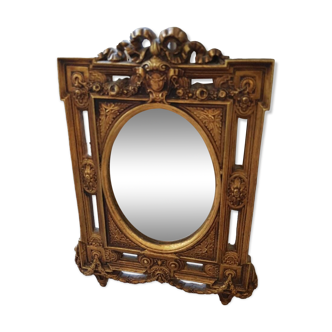 Old small golden mirror