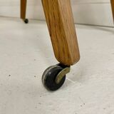 Couffin vintage sur pieds compas à roulettes