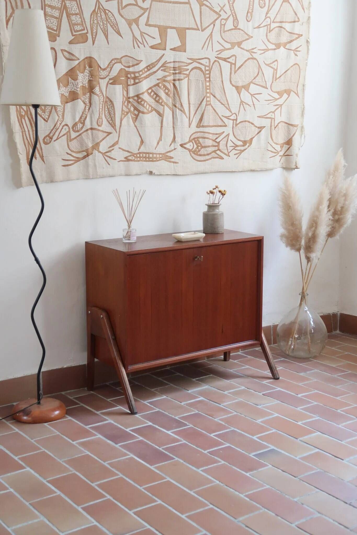 Vintage Scandinavian drop-leaf table in teak wood.