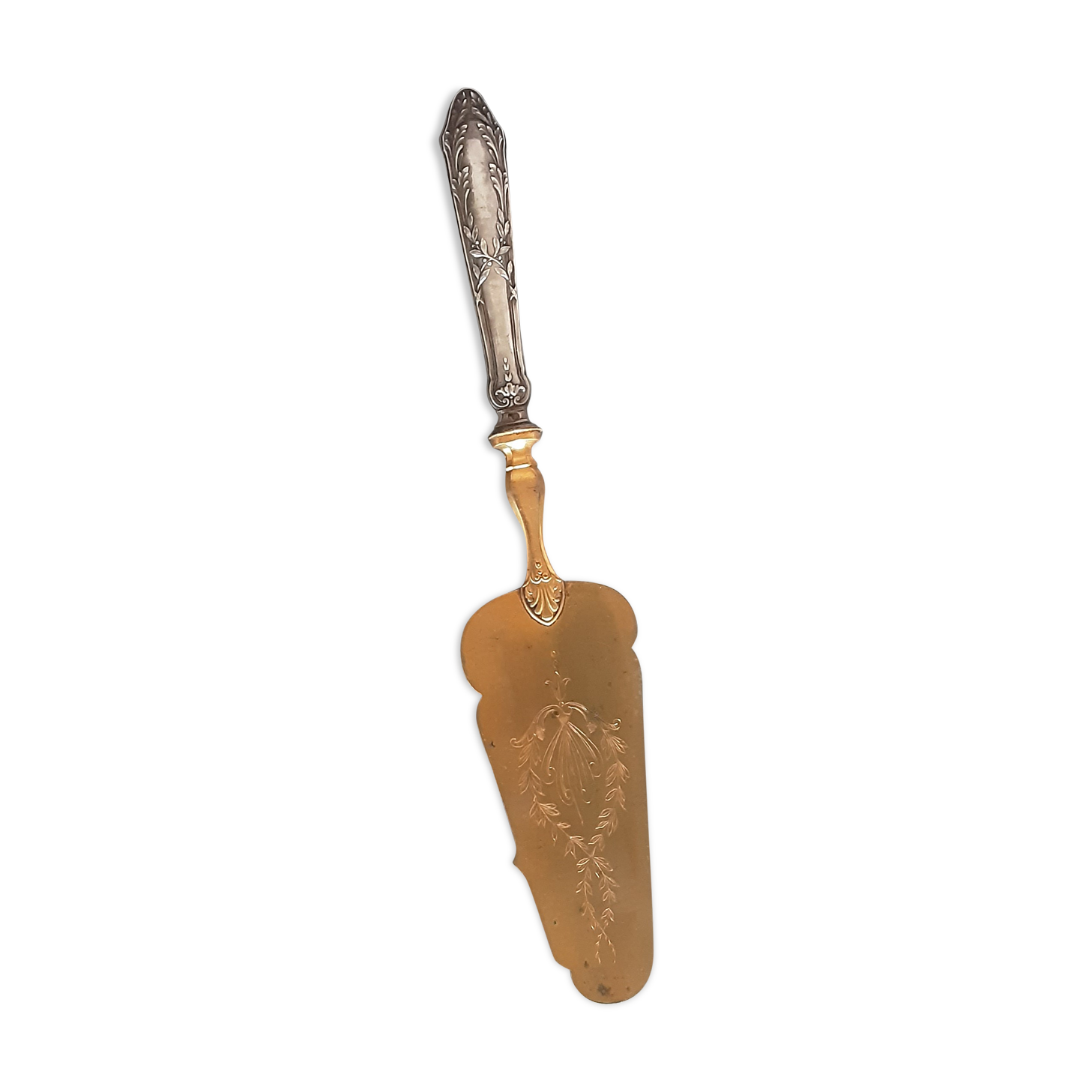 Old brass and silver pie shovel