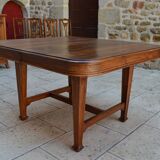 Extendable Art Nouveau table in carved walnut, circa 1900