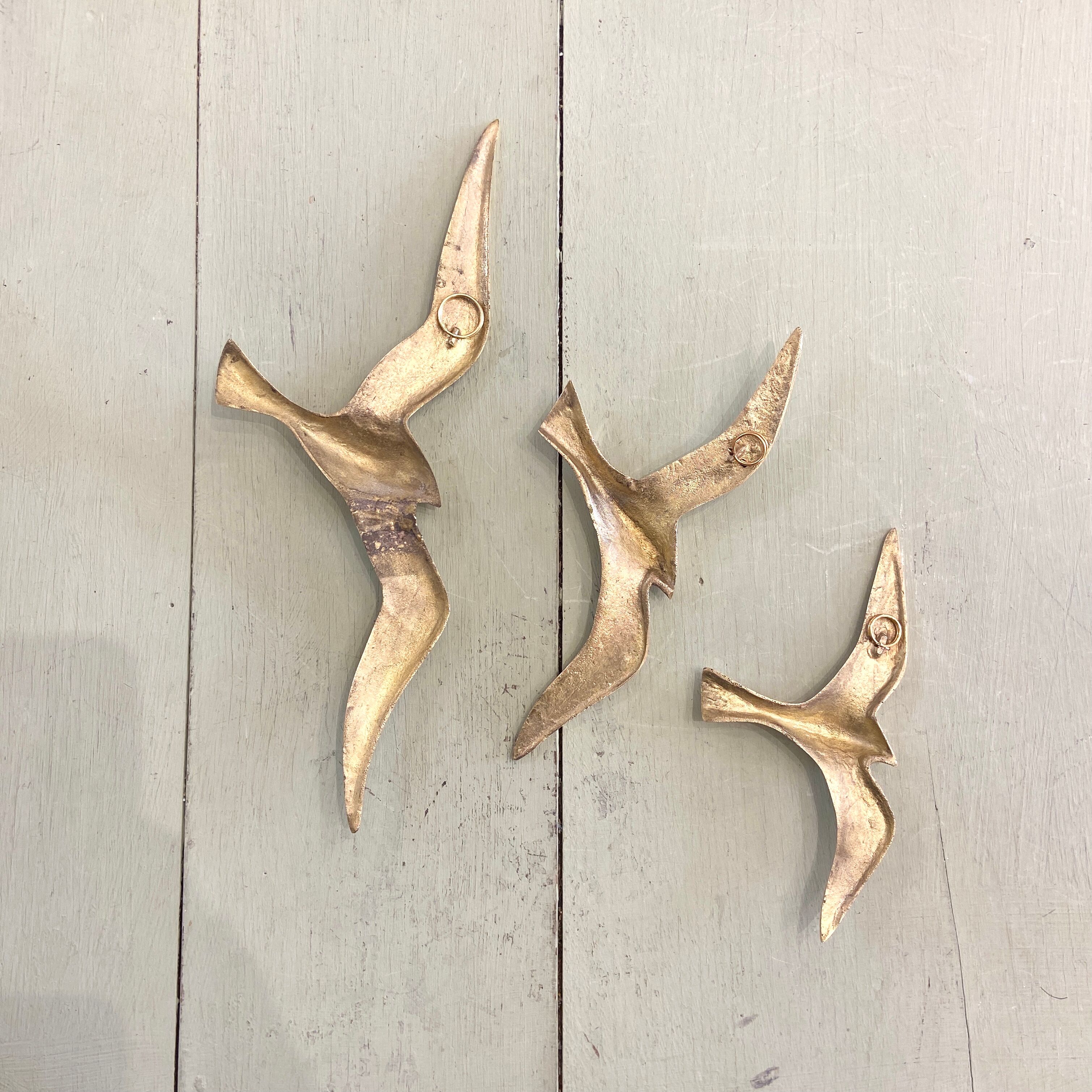 Series of 3 golden brass seagulls to hang