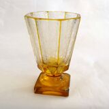 Art Deco vase engraved with flowers, faceted body on a pedestal.