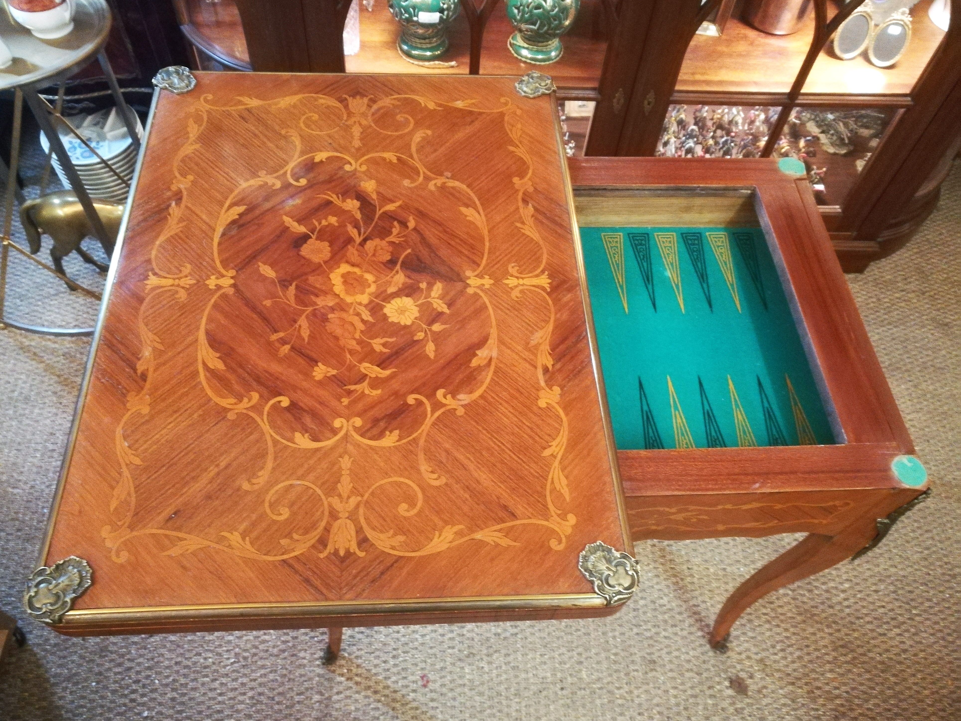Louis XV style game table in marquetry