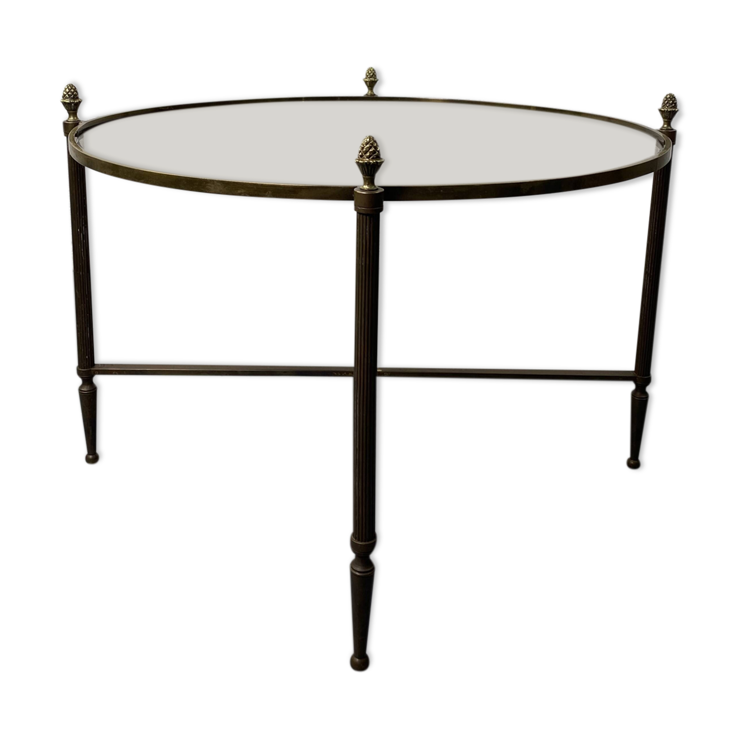 Round coffee table in brass and smoked glass