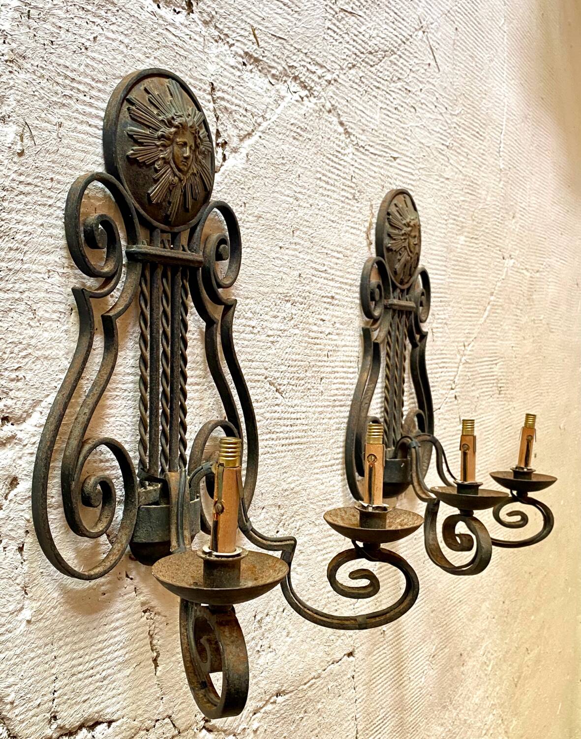 Pair of neoclassical wrought iron wall lights