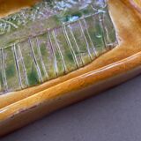 Plat en céramique signé Arlette