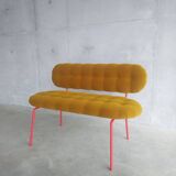 Upholstered bench with tufting
