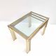 Brass and glass trundle tables