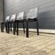 4 black Cassina Cab chairs by Mario Bellini