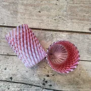 Two Northwood glasses from the 1930s in opalescent pink glass.