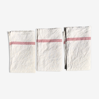 Trio of old linen towel, red enliserai