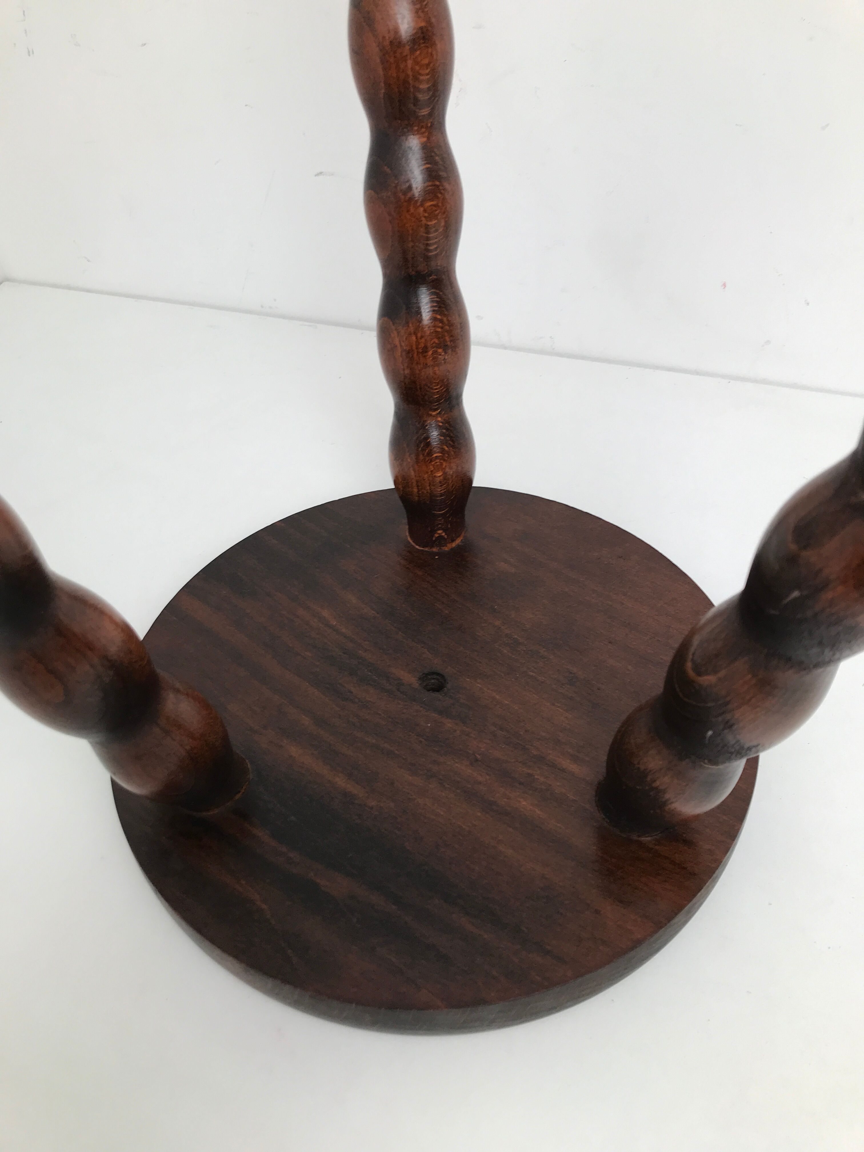 Wooden stool turned tripod foot