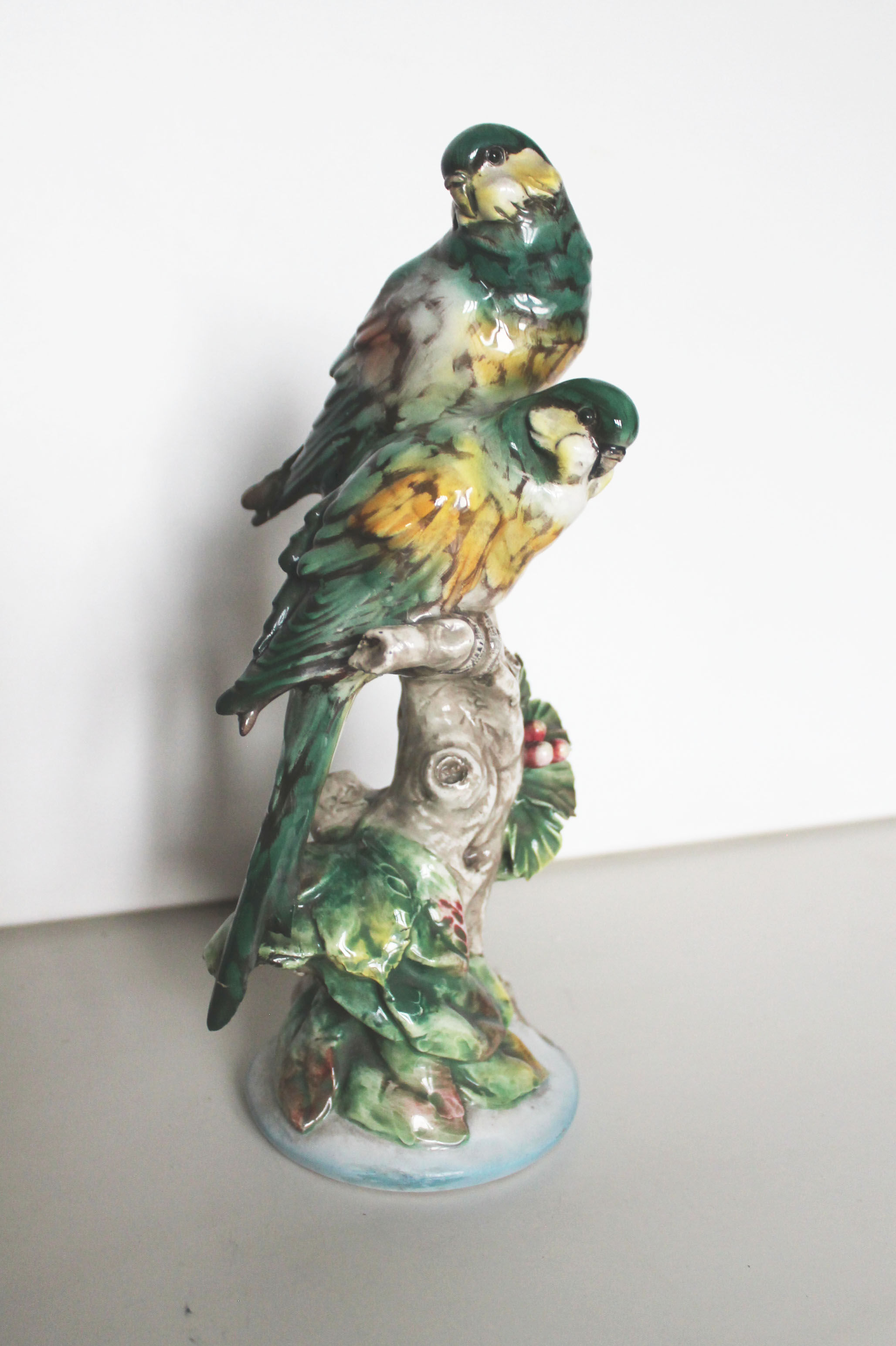 Couple of ceramic parakeets