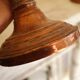 Pair of antique copper candlesticks