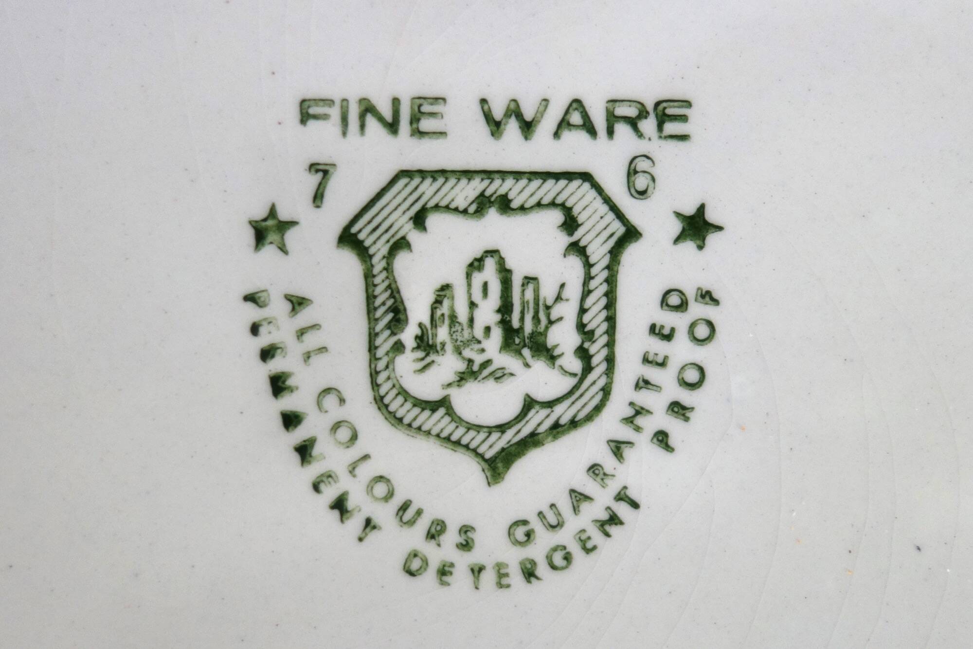 8 fine earthenware dessert plates