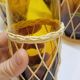 Vintage orangeade service in amber blown glass and wicker