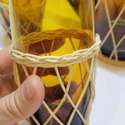 Service à orangeade vintage en verre soufflé ambré et osier