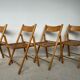Set of 4 folding chairs, vintage design, wooden structure and canned seat. Around 1970