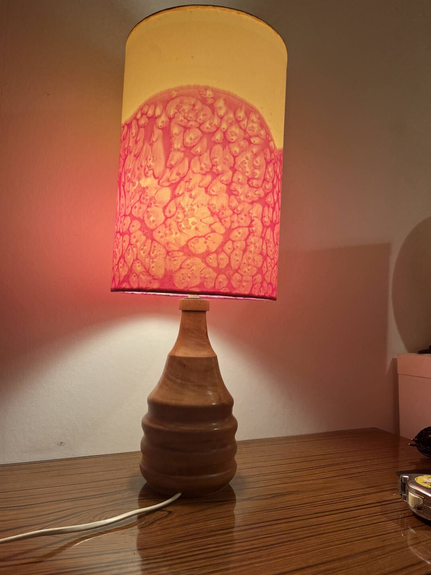 Vintage lamp with a carved wooden base from the 1970s.